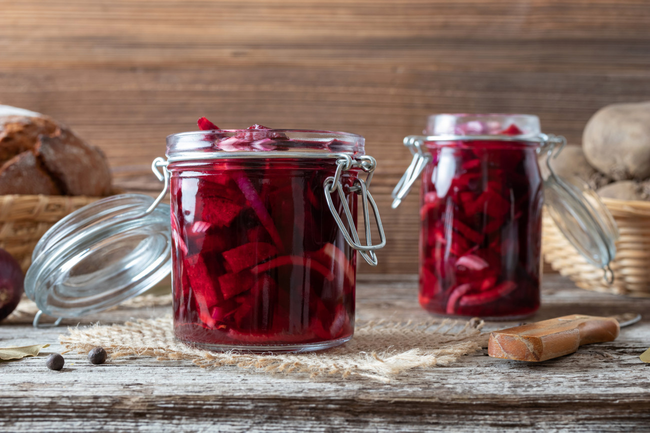 Fermented beet kvass in two glass jars