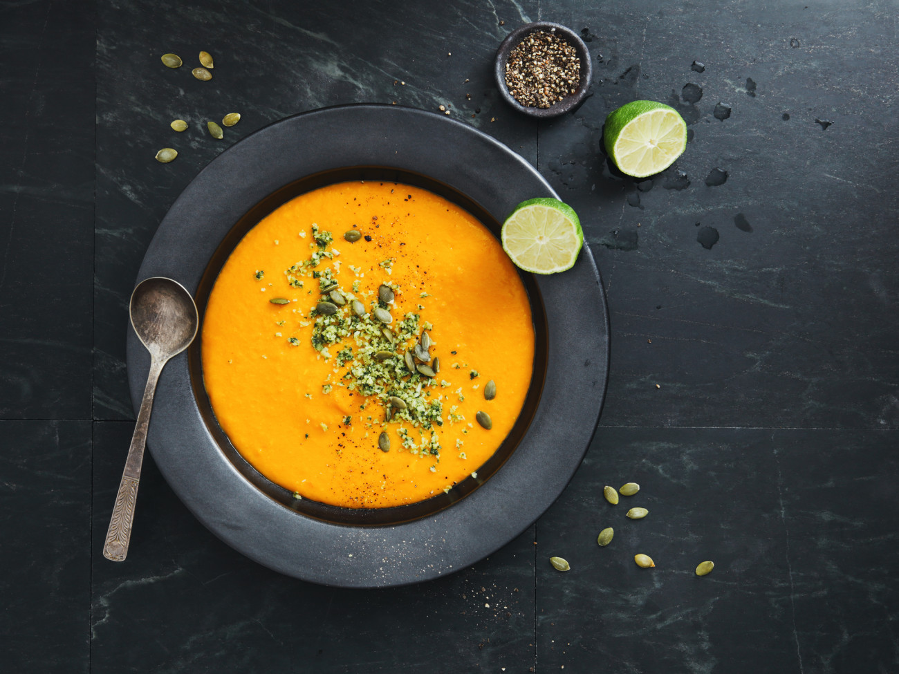 Pumpkin soup with seeds and coconut chili sambal